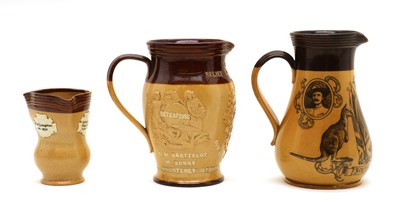 Lot 80 - A collection of Doulton Lambeth stoneware commemorative items