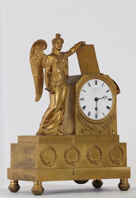Lot 272 - A French Empire ormolu mantel timepiece