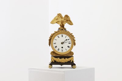 Lot 269 - A French Empire mantel timepiece