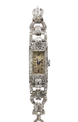 Lot 390 - A ladies' early 20th century diamond set cocktail watch