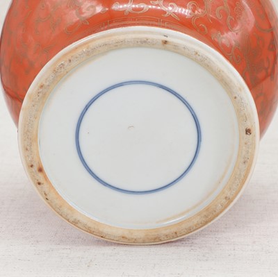 Lot 51 - A pair of Chinese coral-ground vases and covers