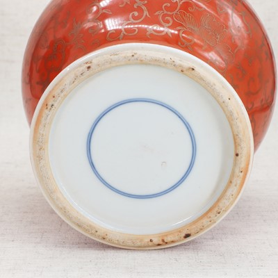 Lot 51 - A pair of Chinese coral-ground vases and covers