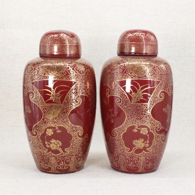 Lot 53 - A pair of Chinese sang-de-boeuf vases and covers