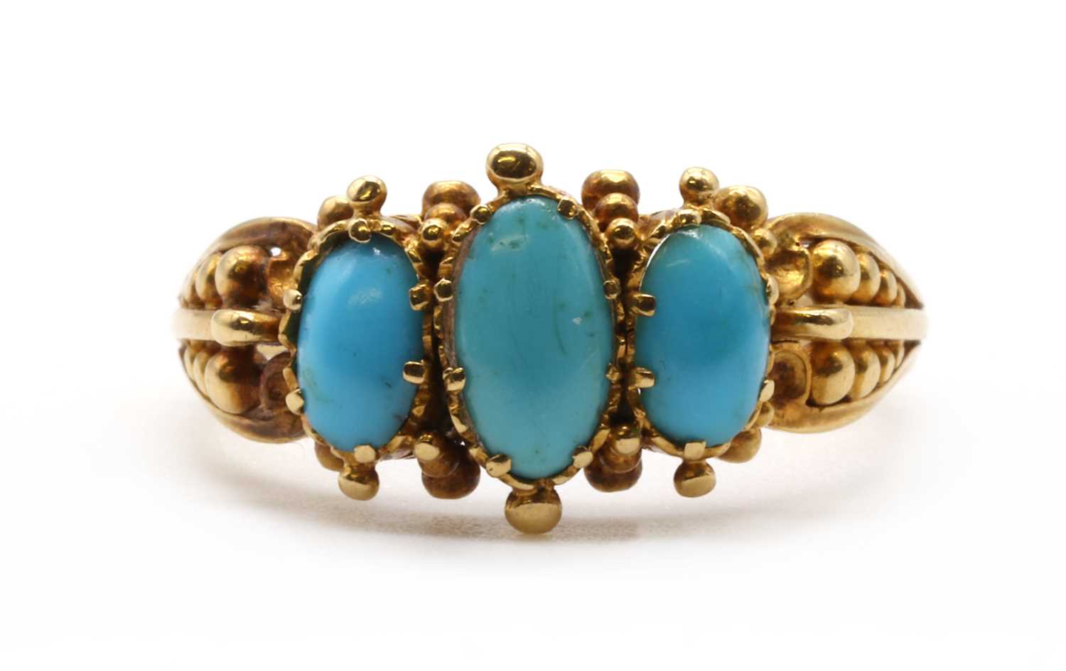 Lot 1 - A Regency gold three stone turquoise ring