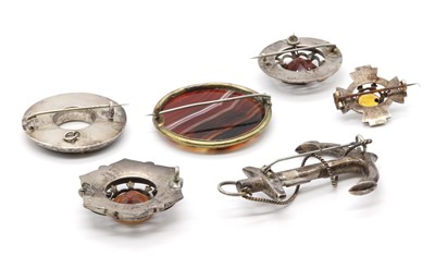 Lot 13 - A collection of Scottish hardstone brooches