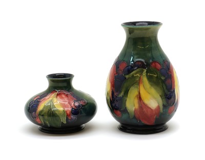 Lot 60 - A Moorcroft pottery 'Leaf and Berry' pattern vase