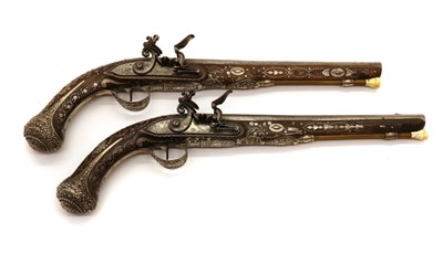 Lot 75 - A pair of French 20 bore flintlock holster pistols