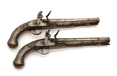 Lot 85 - A pair of Turkish 14 bore silver mounted flintlock holster pistols