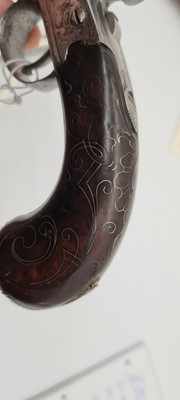 Lot 80 - A pair of flintlock boxlock cannon barrelled pistols by M Collins, Dublin