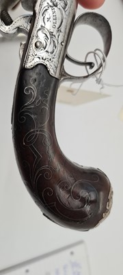 Lot 80 - A pair of flintlock boxlock cannon barrelled pistols by M Collins, Dublin