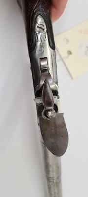 Lot 80 - A pair of flintlock boxlock cannon barrelled pistols by M Collins, Dublin