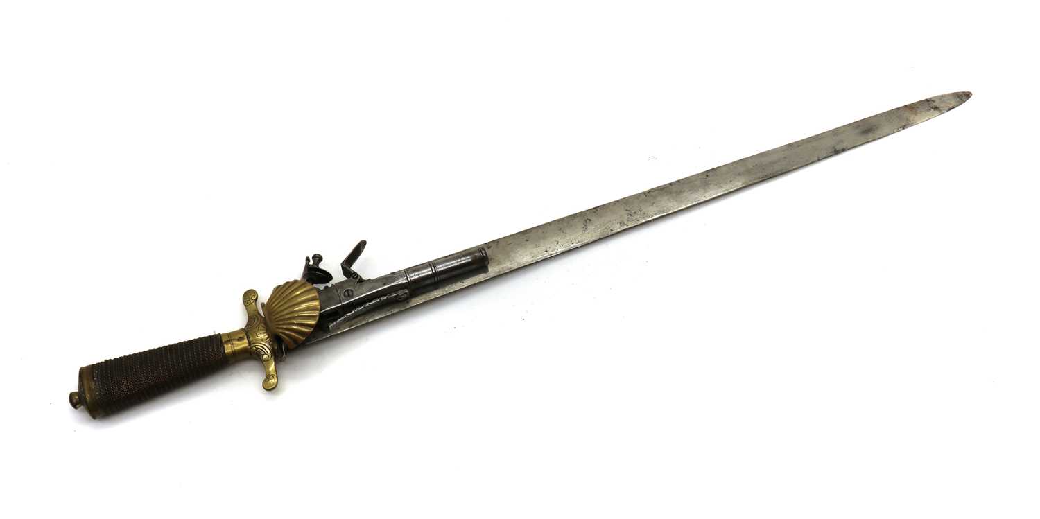Lot 91 - A French flintlock or boxlock hunting pistol and sword