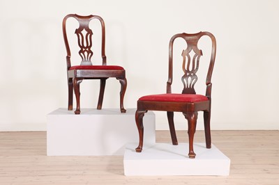 Lot 595 - A pair of walnut side chairs