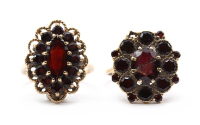 Lot 101 - Two 9ct gold garnet cluster rings