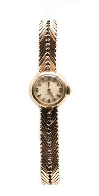 Lot 333 - A ladies' 9ct gold Cyma 'Cymaflex' mechanical bracelet watch