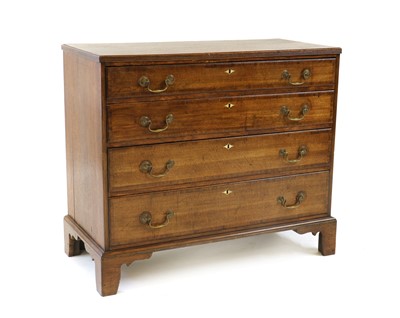Lot 344 - A George III oak and cross banded four drawer chest