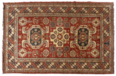 Lot 324 - A tribal carpet