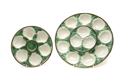 Lot 85 - A set of sixteen Longchamp majolica oyster plates