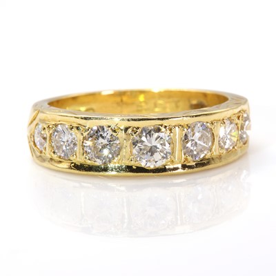 Lot 213 - An 18ct gold diamond set half eternity ring, c.1970