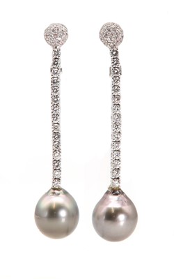 Lot 172 - A pair of Tahitian cultured pearl and diamond drop earrings