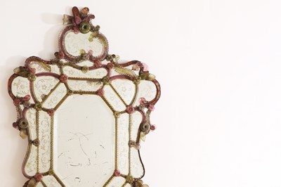 Lot 157 - A coloured glass mirror