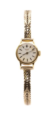 Lot 332 - A ladies' gold Longines mechanical bracelet watch