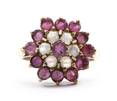 Lot 97 - A 9ct gold ruby and moonstone target cluster ring