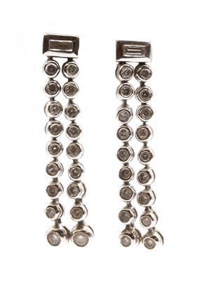 Lot 72 - A pair of 18ct white gold diamond drop earrings