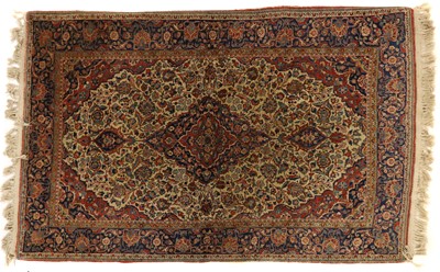 Lot 328 - A Persian Kashan rug