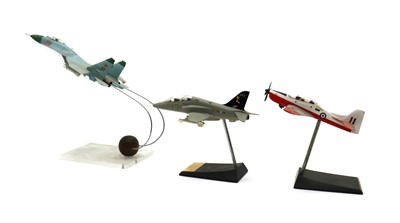 Lot 180 - Three model Military aircraft on display stands