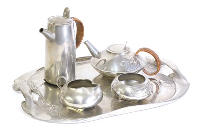 Lot 53 - A matched 'Tudric' pewter three-piece tea set