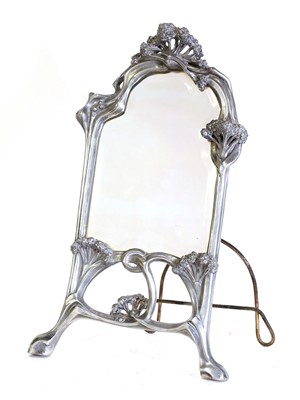 Lot 27 - An Art Nouveau pewter table mirror