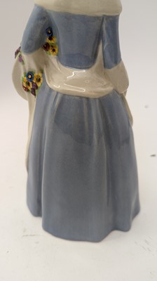 Lot 63 - An Austrian pottery figure of a lady