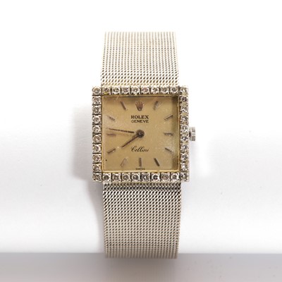 Lot 485 - A ladies' 18ct white gold diamond set Rolex 'Cellini' mechanical bracelet watch, c.1960