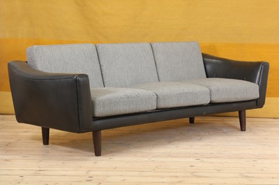 Lot 353 - A Danish three-seater black leather sofa