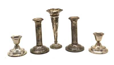 Lot 12 - A collection of silver candlesticks
