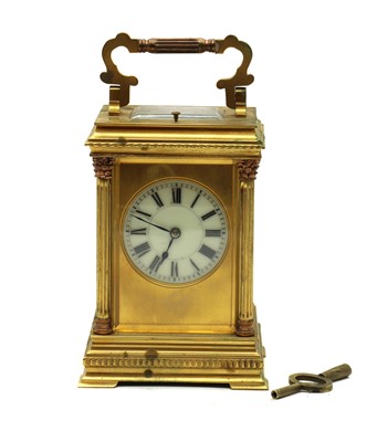 Lot 174 - A French brass cased repeating carriage clock