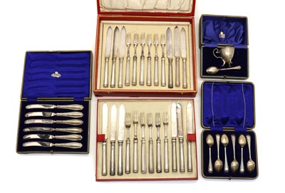 Lot 13 - A collection of cased silver flatware
