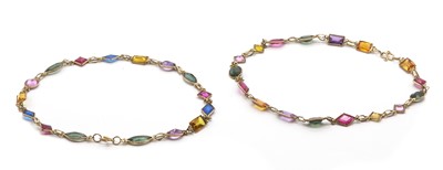 Lot 85 - A pair of gold paste set bracelets