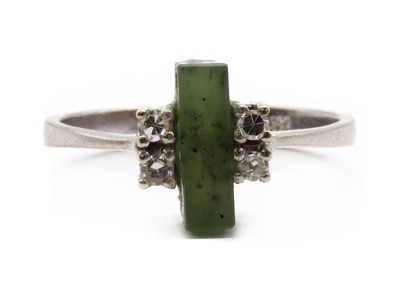 Lot 143 - A white gold nephrite jade and diamond ring