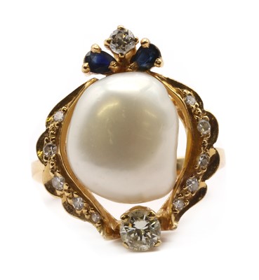 Lot 204 - A gold cultured baroque pearl, diamond and sapphire ring