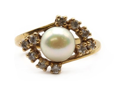 Lot 208 - A gold cultured pearl and diamond ring