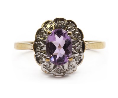 Lot 188 - A 9ct gold amethyst and diamond cluster ring