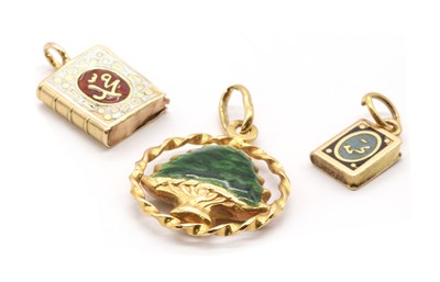 Lot 267 - Three gold enamel pendants/charms