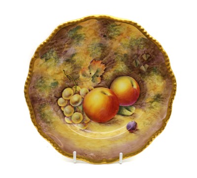 Lot 185 - A Royal Worcester porcelain fallen fruits cabinet plate