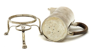 Lot 8 - A silver hot water pot and associated stand