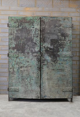 Lot 401 - A patinated industrial iron mine cabinet