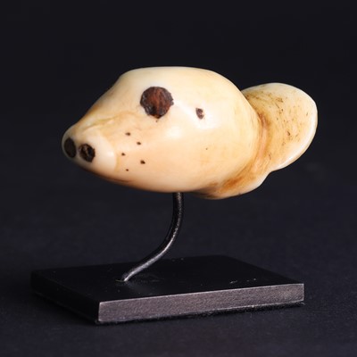 Lot 73 - A Yupik Eskimo attachment in the form of a seal head