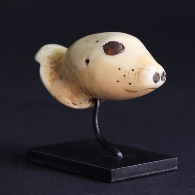 Lot 73 - A Yupik Eskimo attachment in the form of a seal head
