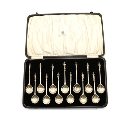 Lot 31 - A cased set of thirteen silver apostle spoons